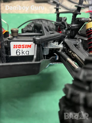 Hosim X07W безчетков мотор RC кола 1/10  Безчеткова скорост 68km/ч Хоби клас 4WD Всички терени, снимка 10 - Коли, камиони, мотори, писти - 51143800