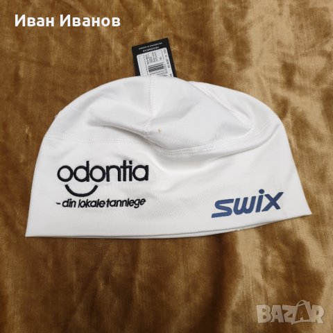 Оригинална ски  шапка  SWIX VERSATELE  , снимка 1 - Шапки - 39595842