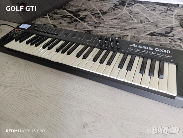 MIDI клавиатура alesis qx49