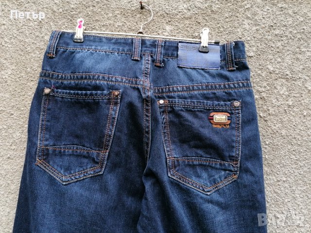 Продавам тъмносини дамски /мъжки дънки Denim Simply , снимка 11 - Дънки - 43865343