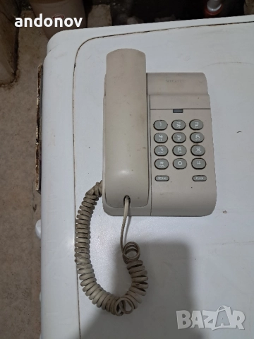 телефон Алкател