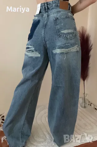 Накъсани сини дънки с широк крачол. Размер Л. 