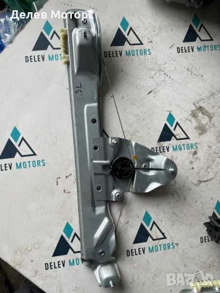 827210622R заден ляв стъклоповдигач от Dacia Duster 1.0 Tce 100 HMMT, 6 ск., двигател H4D480, 2023 г, снимка 1