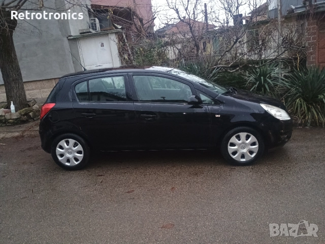 Opel Corsa D 1.2 i 16V ECOTEC (80), снимка 13 - Автомобили и джипове - 52811696