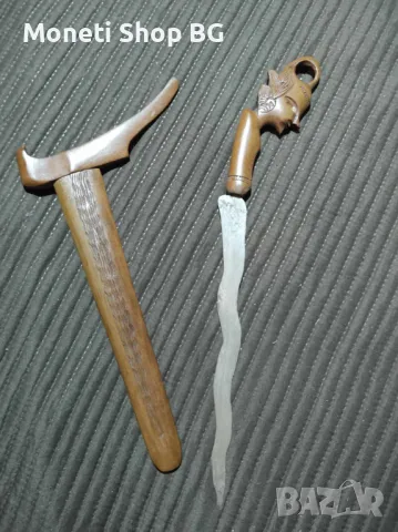 Кама за жертвопринушения с ликът на Гхатоткача