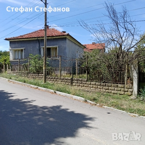 къща на две улици двор 600м2