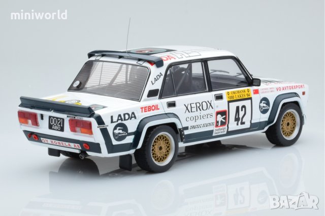 ВАЗ 2105 ЛАДА VFTS Rally 1000 Lakes 1984 - мащаб 1:18 на IXO моделът е нов в PVC дисплей-кейс, снимка 2 - Колекции - 42920203