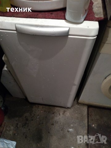 Пералня с горно зареждане