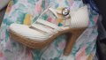 Разкошни български бели обувки на ток с каишка
