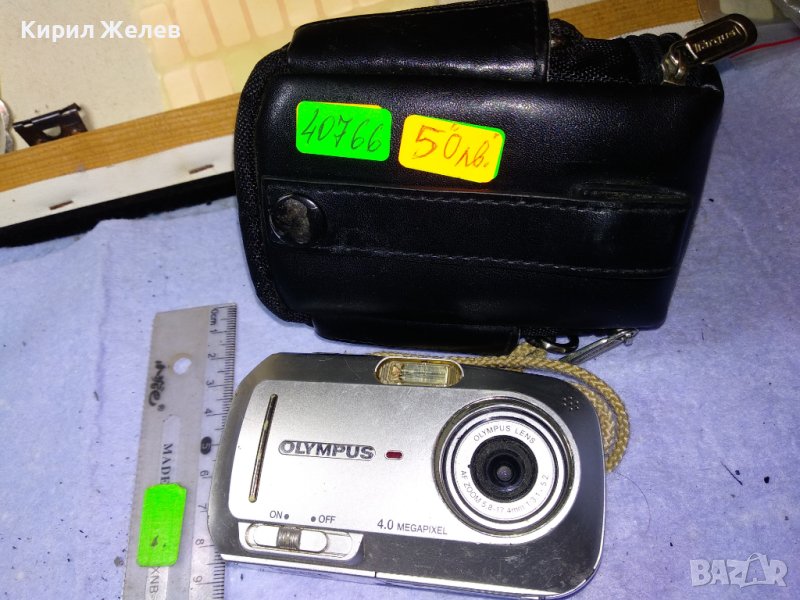 OLYMPUS 4.0 MEGAPIXELS MADE in JAPAN Стар ДИГИТАЛЕН ФОТОАПАРАТ ОЛИМПУС с МАРКОВ КАЛЪФ Targus 40766, снимка 1