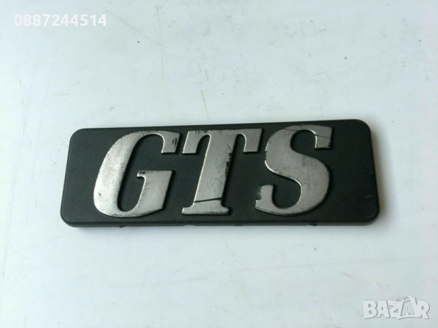 емблема GTS 