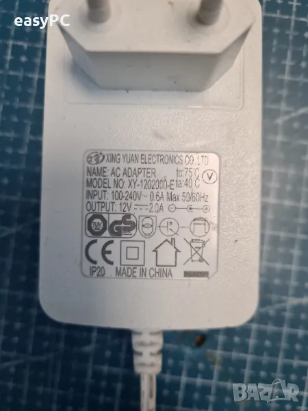 Оригинален захранващ адаптер XING YUAN ELECTRONICS CO.,LTD. XY-1202000-E 12V 2A, снимка 1