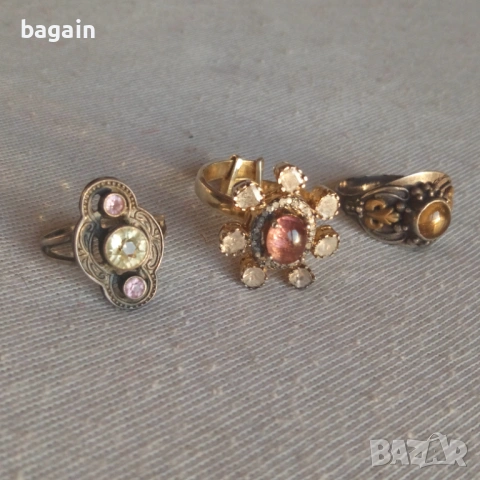 Диаманти и турмалин, сребърни пръстени с позлата.