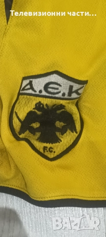 Оригинални футболни шорти къси гащи на АЕК Атина AEK Athens Puma размер XL, снимка 9 - Спортни дрехи, екипи - 51642777