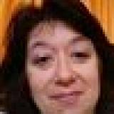 шофьор на бордова Скания с гранд човка